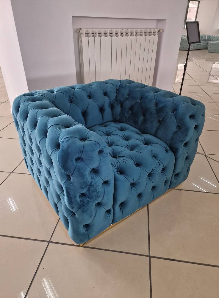 Fotoliu California tapitat cu catifea de la IMPACT MOB, cu design elegant și confortabil, în culori vibrante.