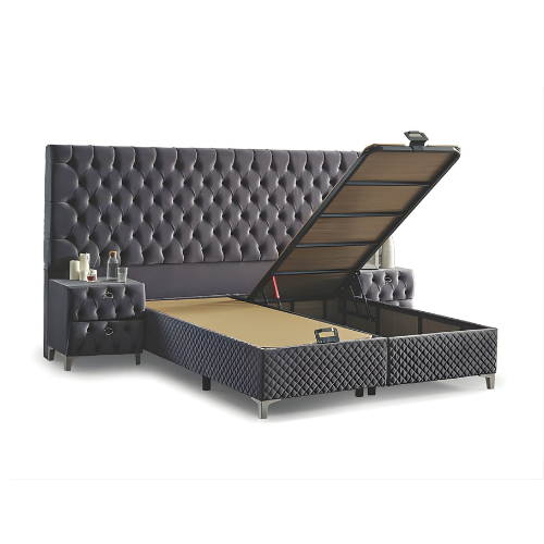 Velvet Pat Boxspring Valura by IMPACT MOB with integrated storage and mattress, featuring a sleek, modern design in a cozy home setting.