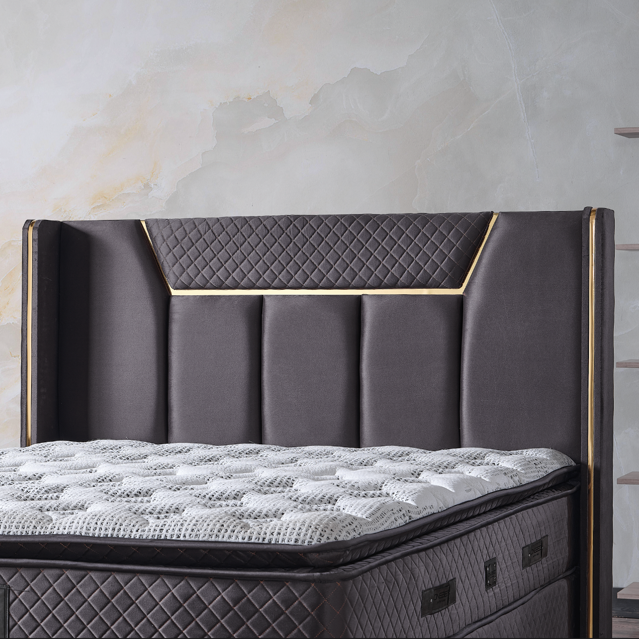 Luxurious beige velvet Pat Boxspring Bazano by IMPACT MOB with built-in storage and matching mattress, available in various colors.