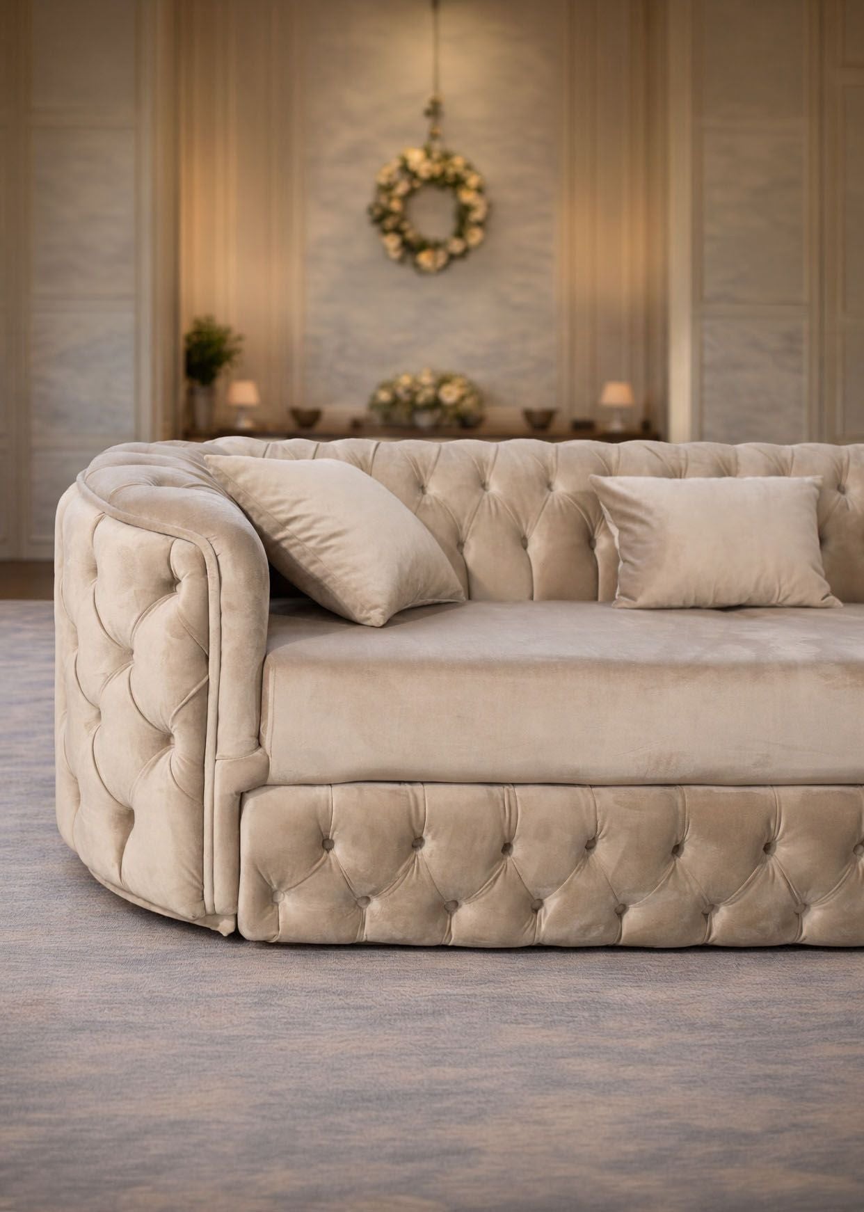 Lugano velvet upholstered sofa by IMPACT MOB, showcasing a modern design with an extended seating option.