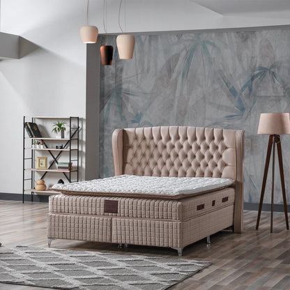 Pat tapitat Boxspring Olivia 160x200 cu saltea inclusă, oferind confort optim pentru un somn odihnitor.