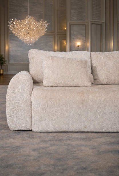 Canapea extensibilă Athena de la IMPACT MOB, cu ladă de depozitare, în nuanță modernă, plasată într-un living elegant.