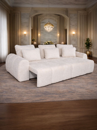 Canapea extensibilă Lisabona IMPACT MOB cu ladă de depozitare, tapitată în țesătură gri, cu perne decorative și suport pentru relaxare.